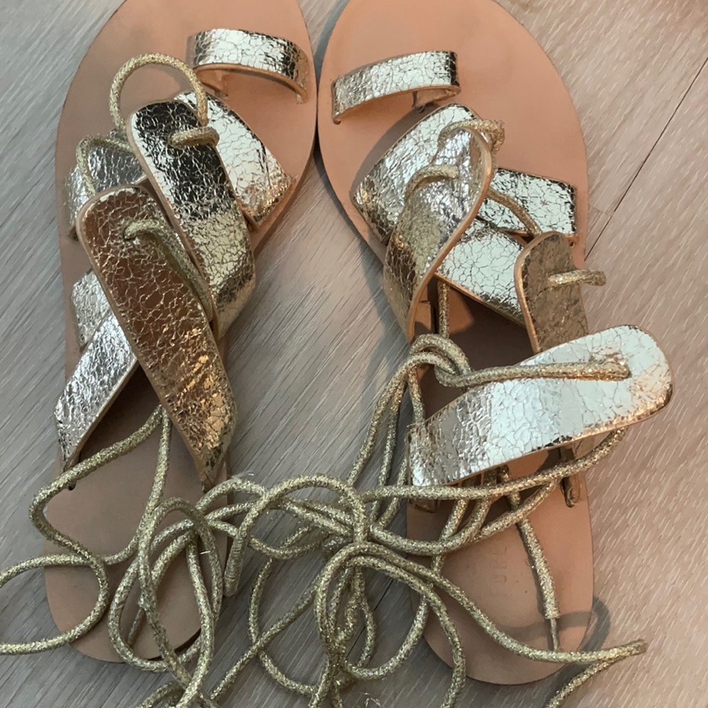 Gold gladiator lace up sandal flat